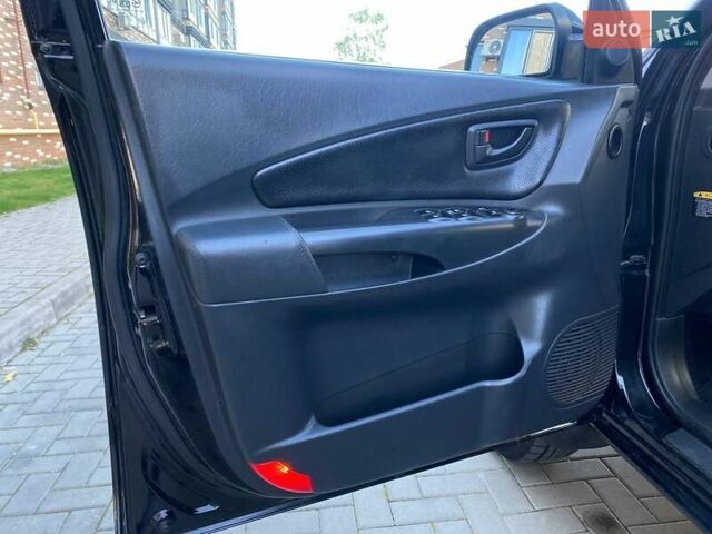 Черный Хендай Туксон, объемом двигателя 1.98 л и пробегом 286 тыс. км за 7300 $, фото 23 на Automoto.ua