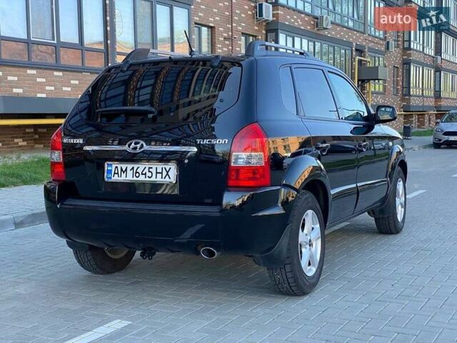 Черный Хендай Туксон, объемом двигателя 1.98 л и пробегом 286 тыс. км за 7300 $, фото 5 на Automoto.ua