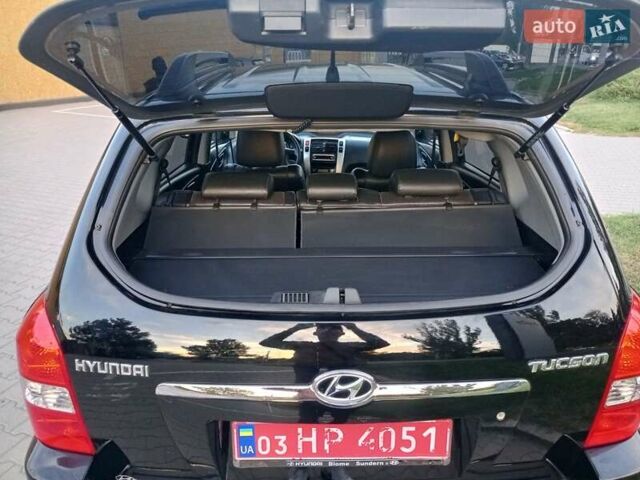 Чорний Хендай Туксон, об'ємом двигуна 1.98 л та пробігом 192 тис. км за 7950 $, фото 42 на Automoto.ua