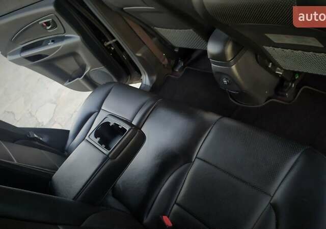 Черный Хендай Туксон, объемом двигателя 2 л и пробегом 230 тыс. км за 8600 $, фото 184 на Automoto.ua