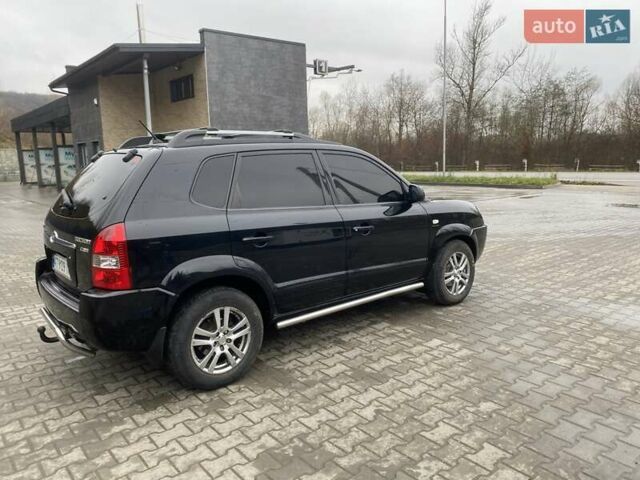 Чорний Хендай Туксон, об'ємом двигуна 1.99 л та пробігом 345 тис. км за 7600 $, фото 12 на Automoto.ua