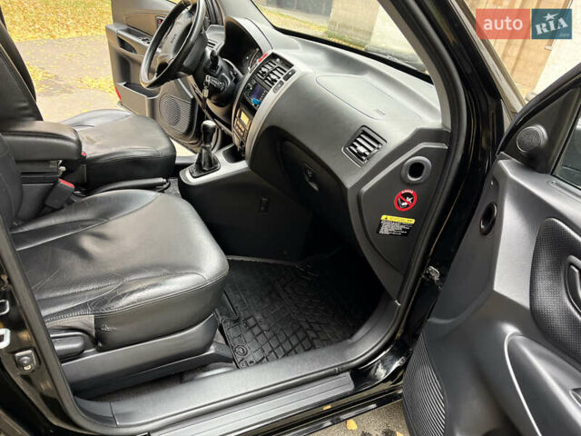 Черный Хендай Туксон, объемом двигателя 1.98 л и пробегом 99 тыс. км за 8999 $, фото 15 на Automoto.ua