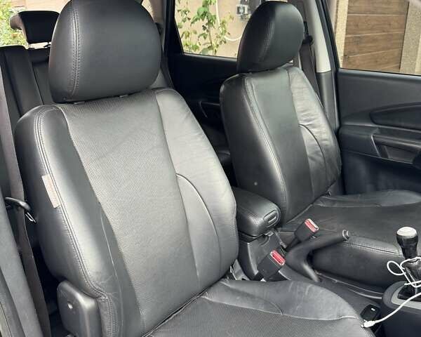 Чорний Хендай Туксон, об'ємом двигуна 1.98 л та пробігом 178 тис. км за 8500 $, фото 16 на Automoto.ua
