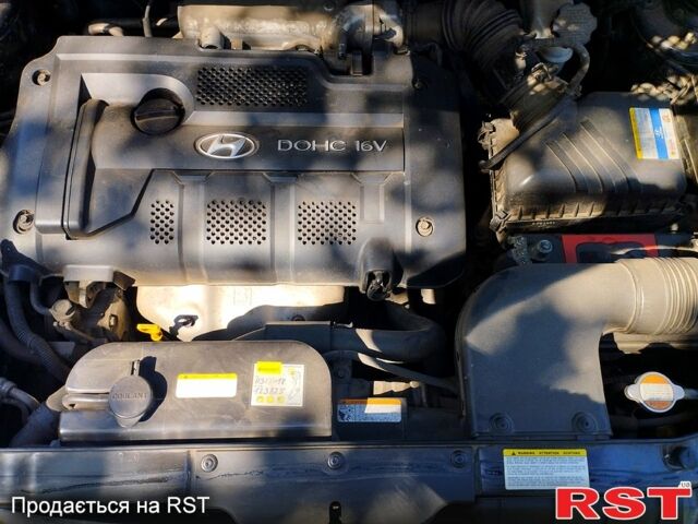 Черный Хендай Туксон, объемом двигателя 2 л и пробегом 230 тыс. км за 8000 $, фото 3 на Automoto.ua