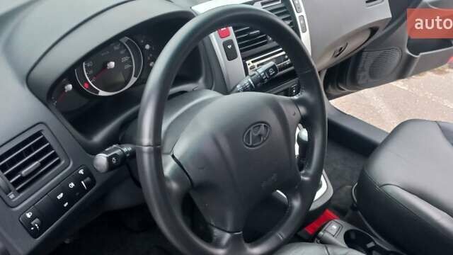 Черный Хендай Туксон, объемом двигателя 1.98 л и пробегом 155 тыс. км за 7999 $, фото 30 на Automoto.ua