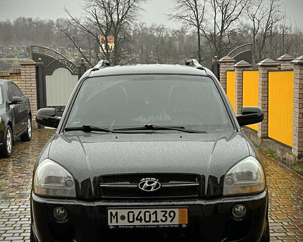 Черный Хендай Туксон, объемом двигателя 2 л и пробегом 151 тыс. км за 9100 $, фото 24 на Automoto.ua