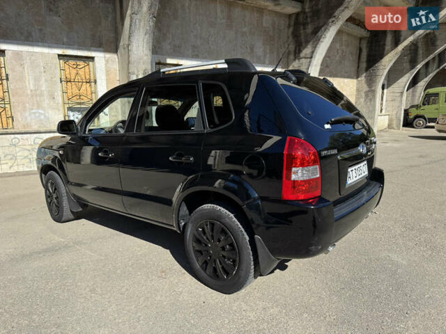 Черный Хендай Туксон, объемом двигателя 2 л и пробегом 189 тыс. км за 8250 $, фото 21 на Automoto.ua