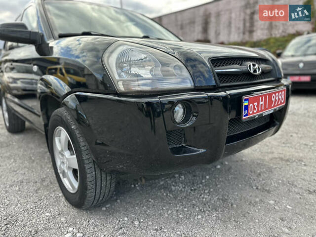 Чорний Хендай Туксон, об'ємом двигуна 2 л та пробігом 180 тис. км за 7999 $, фото 6 на Automoto.ua