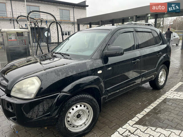 Чорний Хендай Туксон, об'ємом двигуна 1.98 л та пробігом 177 тис. км за 8500 $, фото 1 на Automoto.ua