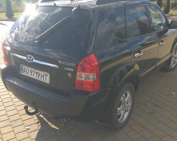 Черный Хендай Туксон, объемом двигателя 2 л и пробегом 277 тыс. км за 7900 $, фото 8 на Automoto.ua