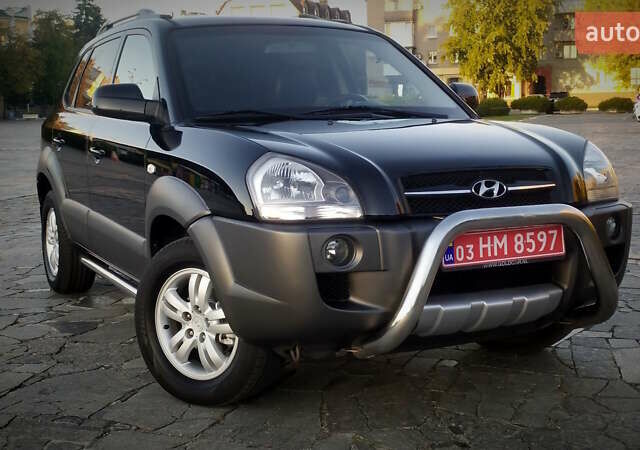 Черный Хендай Туксон, объемом двигателя 2 л и пробегом 230 тыс. км за 8600 $, фото 26 на Automoto.ua