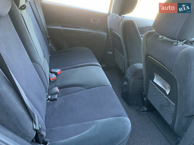 Чорний Хендай Туксон, об'ємом двигуна 2 л та пробігом 56 тис. км за 9500 $, фото 9 на Automoto.ua