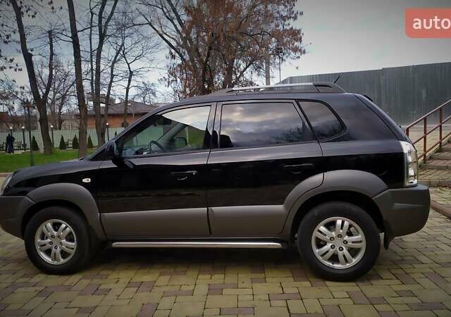 Чорний Хендай Туксон, об'ємом двигуна 2 л та пробігом 229 тис. км за 8600 $, фото 31 на Automoto.ua