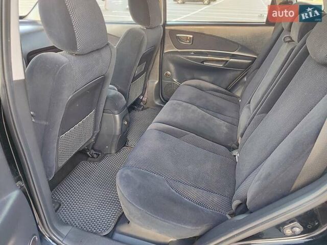 Черный Хендай Туксон, объемом двигателя 2 л и пробегом 280 тыс. км за 6700 $, фото 17 на Automoto.ua