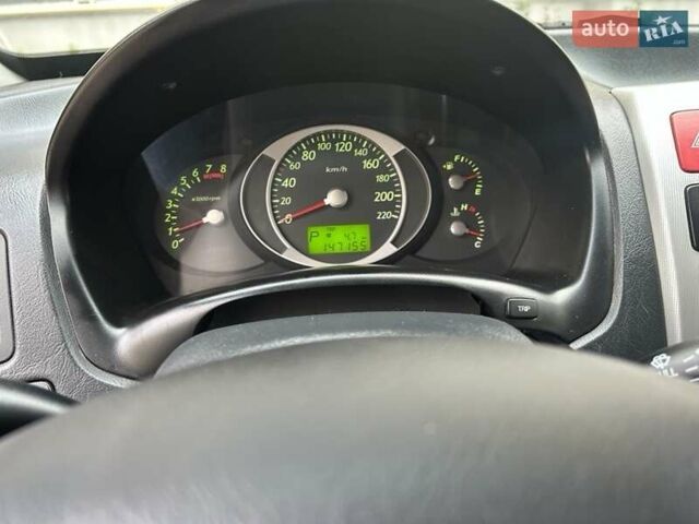 Черный Хендай Туксон, объемом двигателя 1.98 л и пробегом 147 тыс. км за 8000 $, фото 30 на Automoto.ua