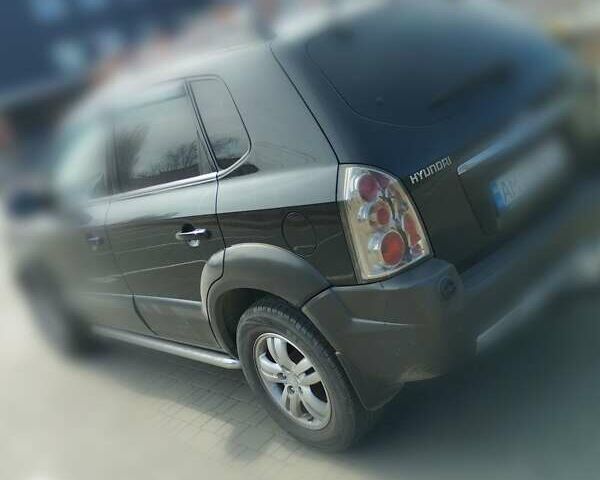 Черный Хендай Туксон, объемом двигателя 2 л и пробегом 250 тыс. км за 7500 $, фото 8 на Automoto.ua