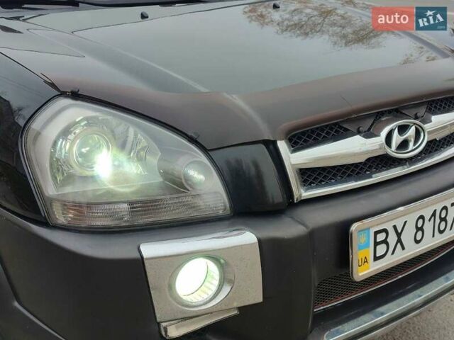 Черный Хендай Туксон, объемом двигателя 2 л и пробегом 270 тыс. км за 6800 $, фото 13 на Automoto.ua