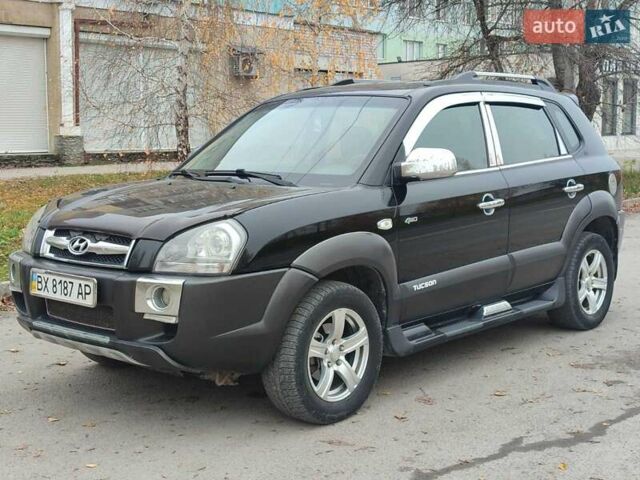 Черный Хендай Туксон, объемом двигателя 2 л и пробегом 270 тыс. км за 6800 $, фото 3 на Automoto.ua