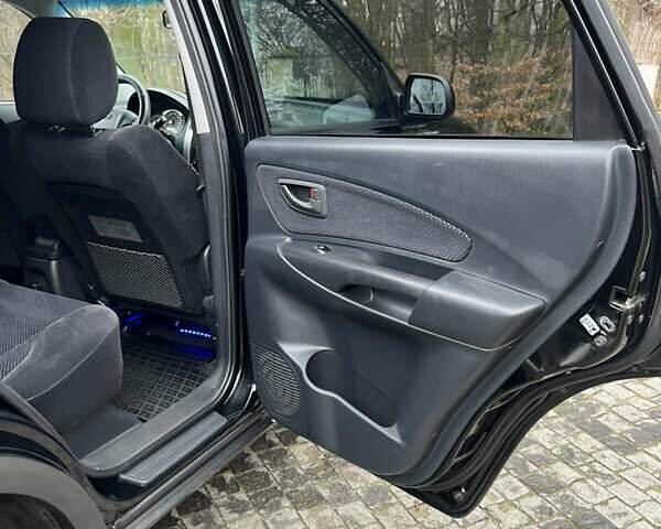 Чорний Хендай Туксон, об'ємом двигуна 1.98 л та пробігом 155 тис. км за 8750 $, фото 16 на Automoto.ua