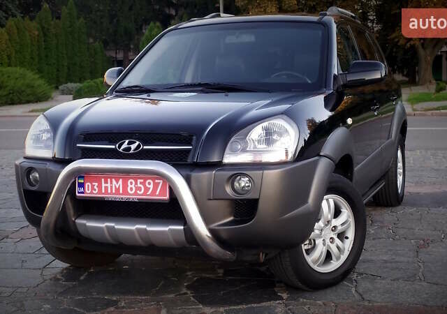 Черный Хендай Туксон, объемом двигателя 2 л и пробегом 230 тыс. км за 8600 $, фото 85 на Automoto.ua