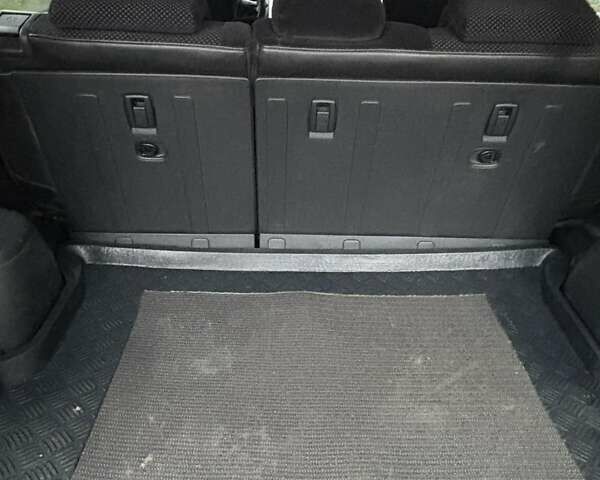 Черный Хендай Туксон, объемом двигателя 1.98 л и пробегом 273 тыс. км за 7400 $, фото 8 на Automoto.ua