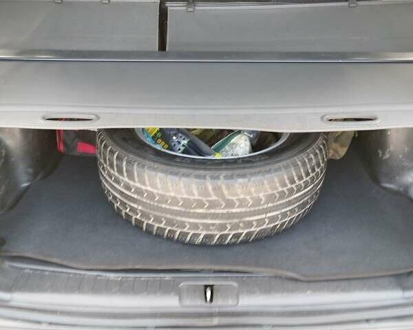 Черный Хендай Туксон, объемом двигателя 2 л и пробегом 270 тыс. км за 7500 $, фото 6 на Automoto.ua