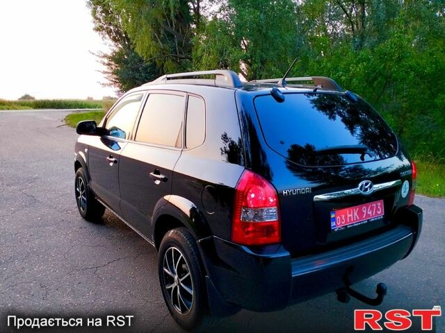 Черный Хендай Туксон, объемом двигателя 2 л и пробегом 165 тыс. км за 9900 $, фото 7 на Automoto.ua