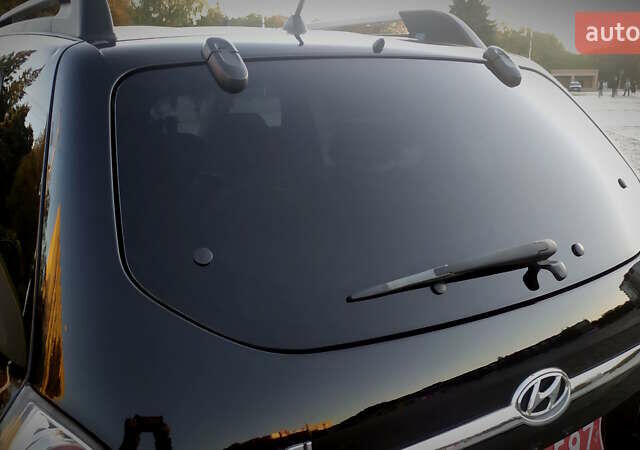 Черный Хендай Туксон, объемом двигателя 2 л и пробегом 230 тыс. км за 8600 $, фото 73 на Automoto.ua