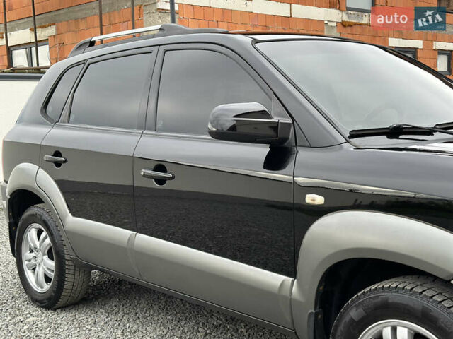 Хендай Туксон 2007 в Ужгороде на Automoto.ua Черный Хендай Туксон, объемом двигателя 1.98 л и пробегом 157 тыс. км за 7300 $, фото 20 на Automoto.ua