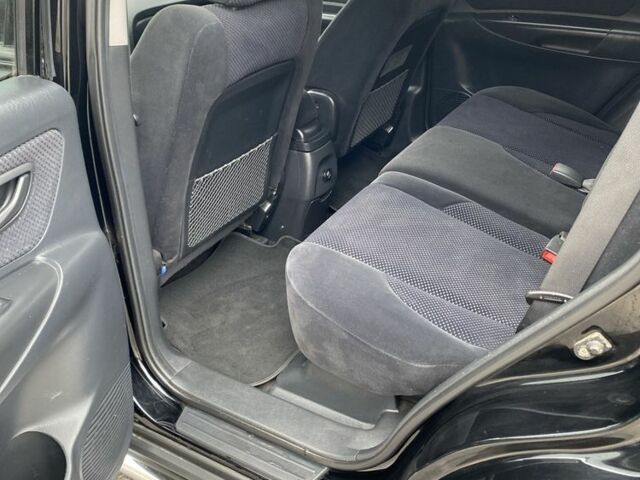 Черный Хендай Туксон, объемом двигателя 2 л и пробегом 330 тыс. км за 4350 $, фото 14 на Automoto.ua