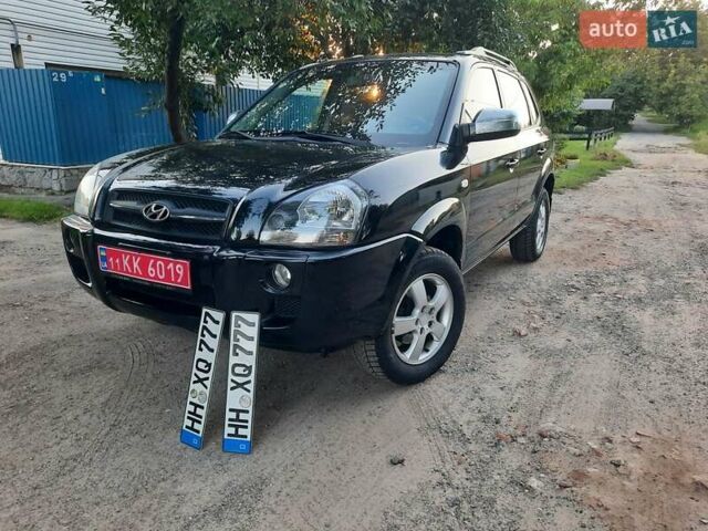 Черный Хендай Туксон, объемом двигателя 2 л и пробегом 219 тыс. км за 7990 $, фото 2 на Automoto.ua