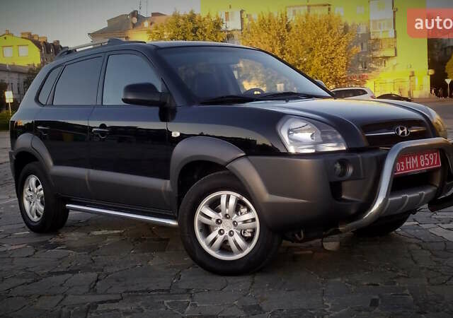 Черный Хендай Туксон, объемом двигателя 2 л и пробегом 230 тыс. км за 8600 $, фото 31 на Automoto.ua