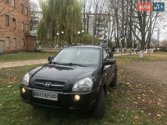 Черный Хендай Туксон, объемом двигателя 2 л и пробегом 210 тыс. км за 8999 $, фото 2 на Automoto.ua