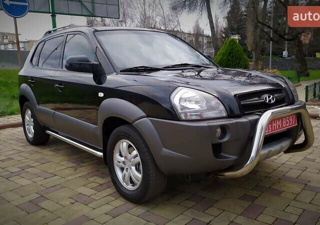 Чорний Хендай Туксон, об'ємом двигуна 2 л та пробігом 229 тис. км за 8600 $, фото 19 на Automoto.ua