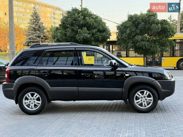 Чорний Хендай Туксон, об'ємом двигуна 1.98 л та пробігом 205 тис. км за 7700 $, фото 13 на Automoto.ua