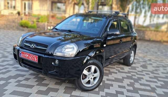 Черный Хендай Туксон, объемом двигателя 2 л и пробегом 190 тыс. км за 8150 $, фото 19 на Automoto.ua