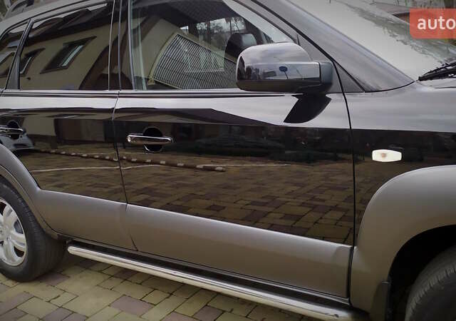 Чорний Хендай Туксон, об'ємом двигуна 2 л та пробігом 229 тис. км за 8600 $, фото 68 на Automoto.ua