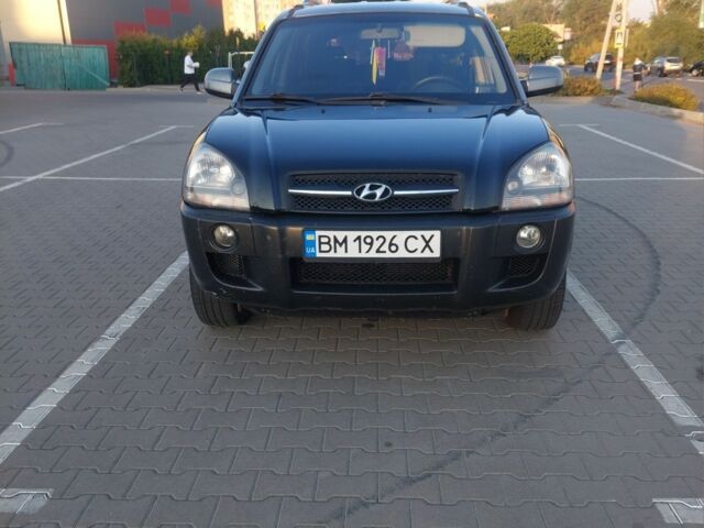 Черный Хендай Туксон, объемом двигателя 2 л и пробегом 289 тыс. км за 6600 $, фото 1 на Automoto.ua