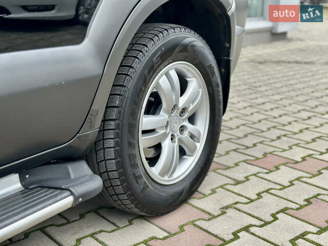 Чорний Хендай Туксон, об'ємом двигуна 2.66 л та пробігом 145 тис. км за 8900 $, фото 10 на Automoto.ua