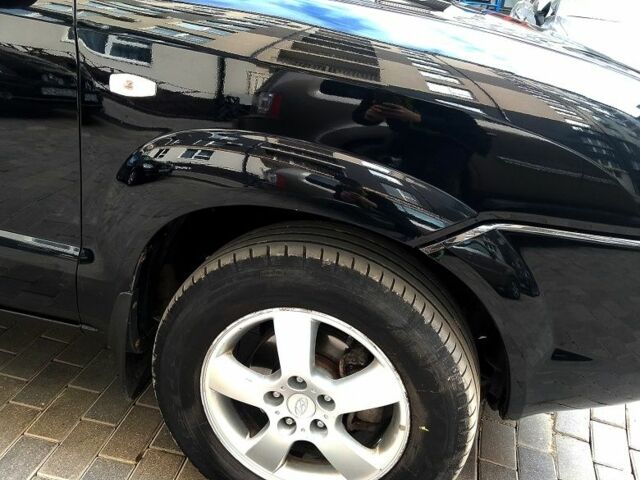 Чорний Хендай Туксон, об'ємом двигуна 2 л та пробігом 190 тис. км за 7500 $, фото 5 на Automoto.ua