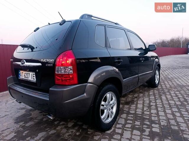 Черный Хендай Туксон, объемом двигателя 2 л и пробегом 280 тыс. км за 9500 $, фото 14 на Automoto.ua