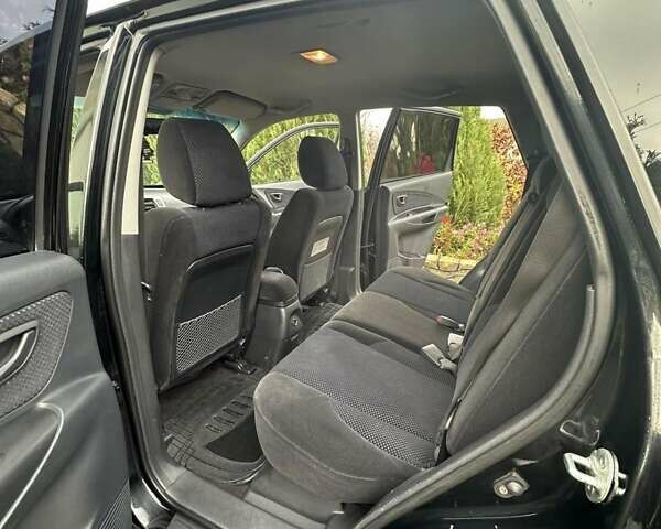 Черный Хендай Туксон, объемом двигателя 2 л и пробегом 218 тыс. км за 7600 $, фото 21 на Automoto.ua