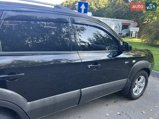 Чорний Хендай Туксон, об'ємом двигуна 1.98 л та пробігом 207 тис. км за 8500 $, фото 5 на Automoto.ua