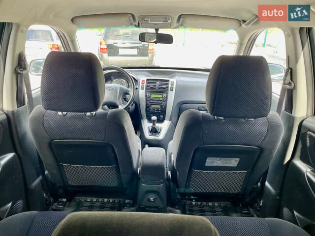 Черный Хендай Туксон, объемом двигателя 2 л и пробегом 224 тыс. км за 7750 $, фото 29 на Automoto.ua