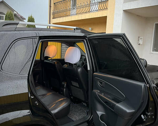 Черный Хендай Туксон, объемом двигателя 2 л и пробегом 151 тыс. км за 9100 $, фото 16 на Automoto.ua