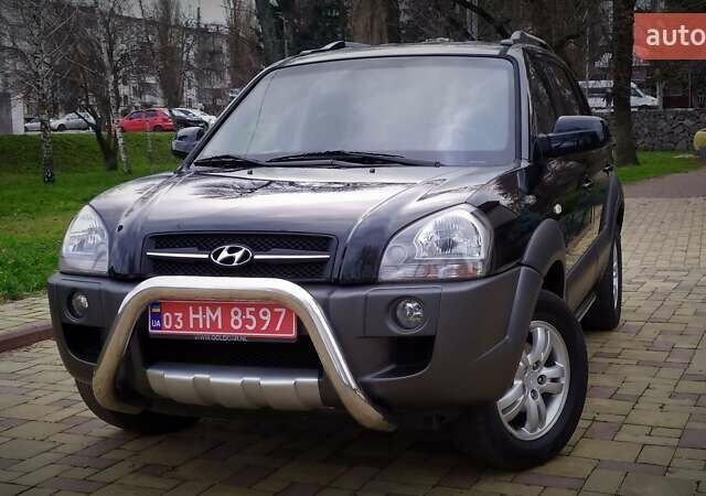 Чорний Хендай Туксон, об'ємом двигуна 2 л та пробігом 229 тис. км за 8600 $, фото 1 на Automoto.ua