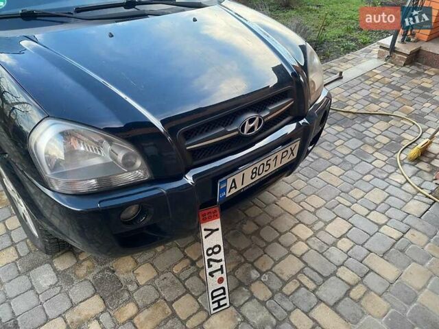 Черный Хендай Туксон, объемом двигателя 2 л и пробегом 84 тыс. км за 8650 $, фото 6 на Automoto.ua