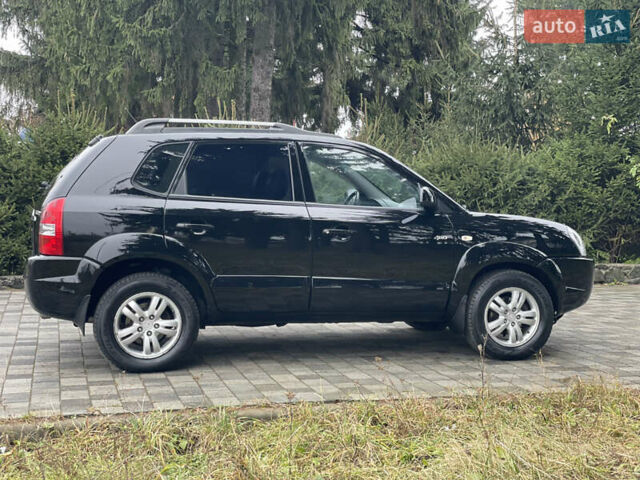 Черный Хендай Туксон, объемом двигателя 2 л и пробегом 180 тыс. км за 7700 $, фото 10 на Automoto.ua