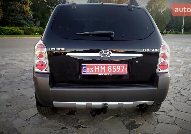 Черный Хендай Туксон, объемом двигателя 2 л и пробегом 230 тыс. км за 8600 $, фото 43 на Automoto.ua