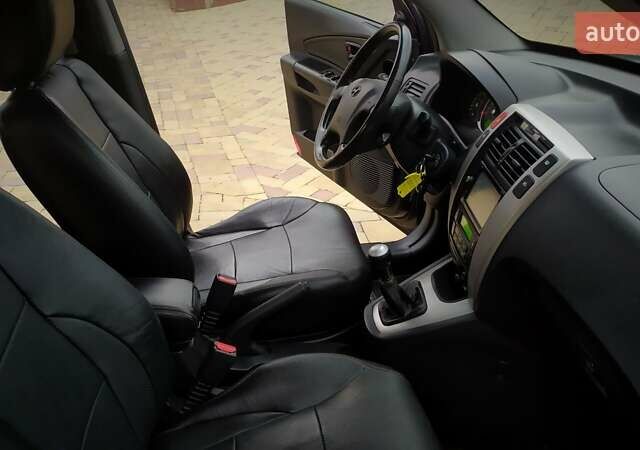 Чорний Хендай Туксон, об'ємом двигуна 2 л та пробігом 229 тис. км за 8600 $, фото 112 на Automoto.ua